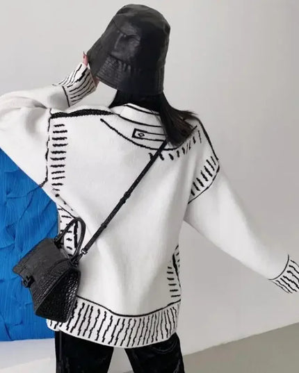 Schwarzer Strickmantel mit aufgemalten Taschen, Nahaufnahme