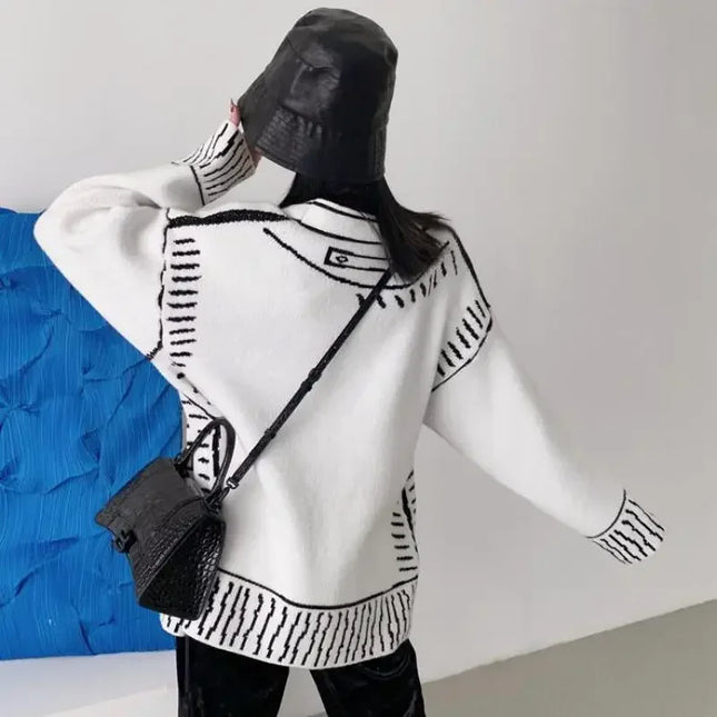 Schwarzer Strickmantel mit aufgemalten Taschen, Nahaufnahme