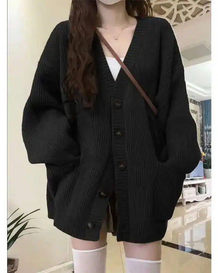 Schwarzer Strickmantel knielang im Oversize-Schnitt mit Knopfleiste