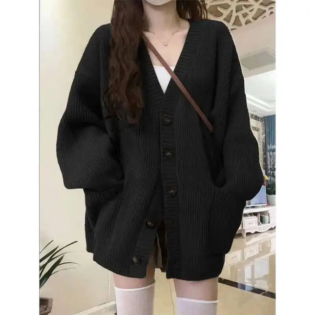 Schwarzer Strickmantel knielang im Oversize-Schnitt mit Knopfleiste